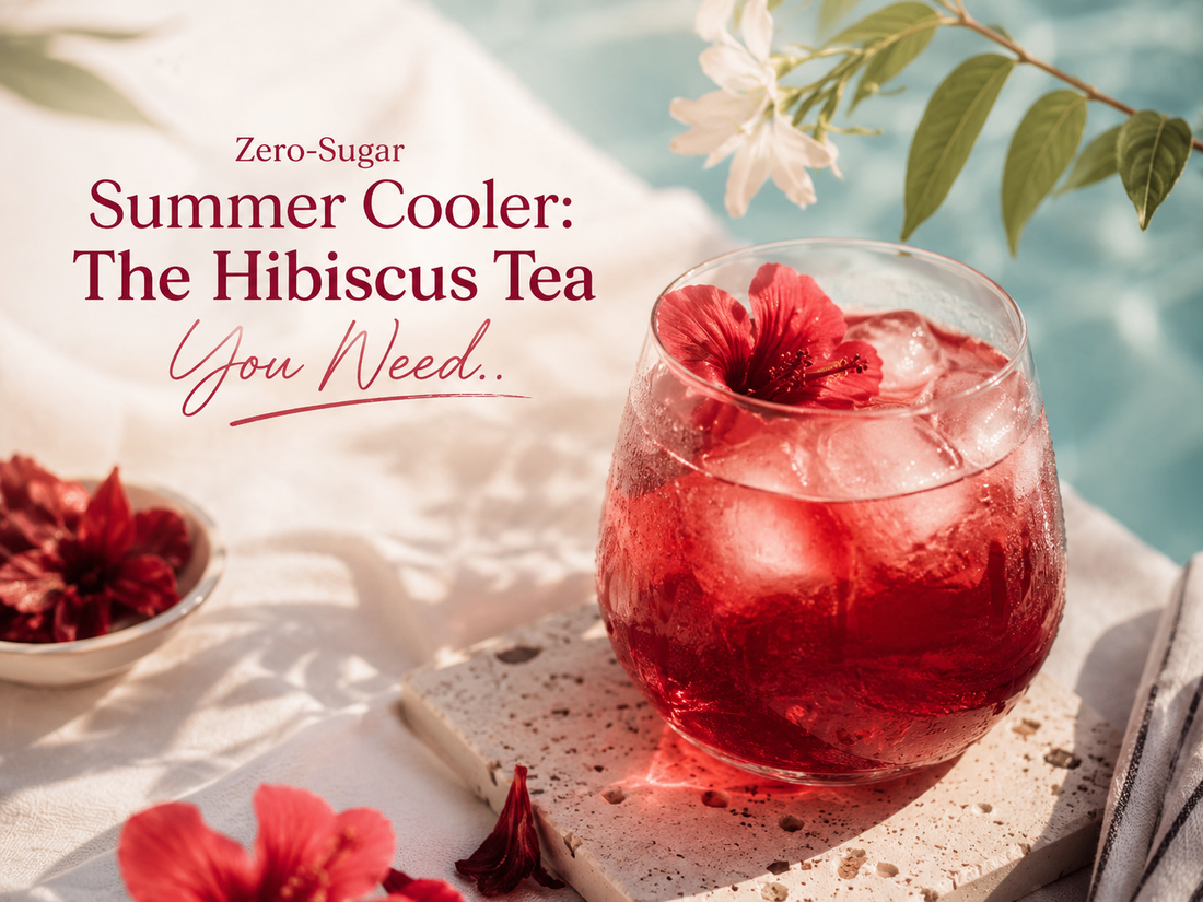 A chilled glass of vibrant hibiscus iced tea with ice cubes and fresh hibiscus flowers, served in a bright summer setting, showcasing a refreshing zero-sugar tea perfect for hydration and wellness.